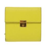 Pre-owned Leather wallets Hermès Vintage , Yellow , Dames