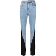 Medium blauwe high waist jeans met contrasterende inzetstukken Mugler ...