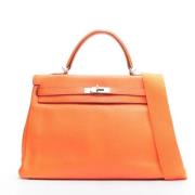 Pre-owned Leather handbags Hermès Vintage , Orange , Dames