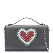 Pre-owned Leather clutches Valentino Vintage , Black , Dames