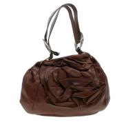 Pre-owned Leather handbags Yves Saint Laurent Vintage , Brown , Dames