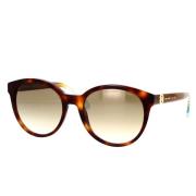 Moderne en vrouwelijke zonnebril met een vleugje luxe Marc Jacobs , Br...
