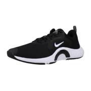 Stijlvolle trainingssneakers voor vrouwen Nike , Black , Dames