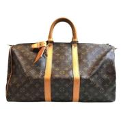 Pre-owned Canvas handbags Louis Vuitton Vintage , Brown , Dames