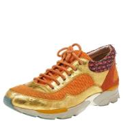 Pre-owned Leather sneakers Chanel Vintage , Orange , Dames