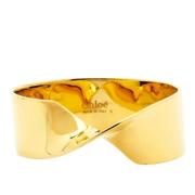 Pre-owned Metal bracelets Chloé Pre-owned , Yellow , Dames
