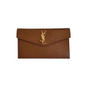 Pre-owned Leather clutches Yves Saint Laurent Vintage , Brown , Dames