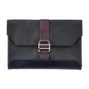 Pre-owned Leather clutches Hermès Vintage , Black , Dames