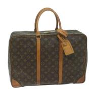 Pre-owned Canvas handbags Louis Vuitton Vintage , Brown , Dames