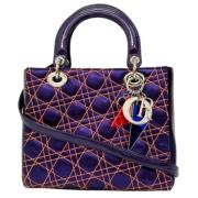 Pre-owned Leather handbags Dior Vintage , Purple , Dames