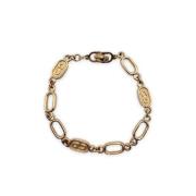 Pre-owned Metal bracelets Dior Vintage , Yellow , Dames