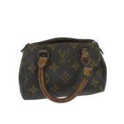 Pre-owned Canvas handbags Louis Vuitton Vintage , Brown , Dames