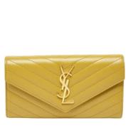 Pre-owned Leather wallets Yves Saint Laurent Vintage , Yellow , Dames