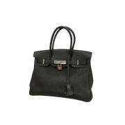 Pre-owned Leather handbags Hermès Vintage , Black , Dames