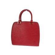 Pre-owned Metal handbags Louis Vuitton Vintage , Red , Dames