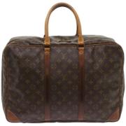 Pre-owned Canvas travel-bags Louis Vuitton Vintage , Brown , Dames