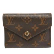 Pre-owned Coated canvas wallets Louis Vuitton Vintage , Brown , Dames