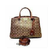 Pre-owned Cotton handbags Coach Pre-owned , Brown , Dames