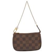 Pre-owned Coated canvas clutches Louis Vuitton Vintage , Brown , Dames