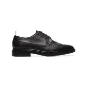 Zwarte platte schoenen met Longwing rubberen zool Brogue Thom Browne ,...