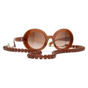 Iconische zonnebril met uniforme lenzen Chanel , Brown , Dames
