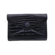 Pre-owned Leather clutches Yves Saint Laurent Vintage , Black , Dames