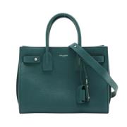 Pre-owned Leather handbags Yves Saint Laurent Vintage , Green , Dames