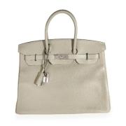 Pre-owned Leather handbags Hermès Vintage , Beige , Dames