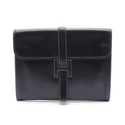 Pre-owned Leather clutches Hermès Vintage , Black , Dames