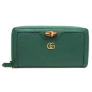 Pre-owned Leather wallets Gucci Vintage , Green , Dames