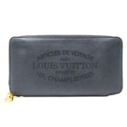 Pre-owned Leather wallets Louis Vuitton Vintage , Gray , Dames