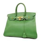 Pre-owned Leather handbags Hermès Vintage , Green , Dames