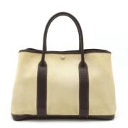 Pre-owned Canvas handbags Hermès Vintage , Beige , Dames