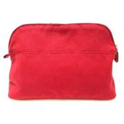 Pre-owned Canvas clutches Hermès Vintage , Red , Dames