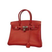 Pre-owned Leather handbags Hermès Vintage , Red , Dames