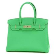 Pre-owned Leather handbags Hermès Vintage , Green , Dames