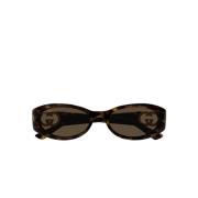 Elegante Ovale Bruin Tortoise Zonnebril Gucci , Brown , Dames