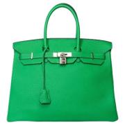 Pre-owned Leather handbags Hermès Vintage , Green , Dames