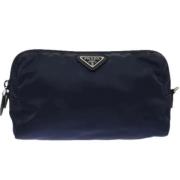 Pre-owned Fabric clutches Prada Vintage , Blue , Dames