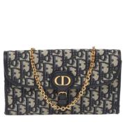 Pre-owned Leather clutches Dior Vintage , Blue , Dames