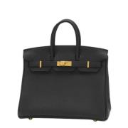 Pre-owned Leather handbags Hermès Vintage , Black , Dames