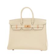 Pre-owned Leather handbags Hermès Vintage , Beige , Dames