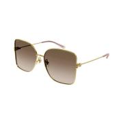 Metalen Frame Zonnebril in Goud en Grijs Gucci , Yellow , Dames