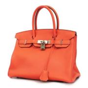 Pre-owned Fabric handbags Hermès Vintage , Orange , Dames