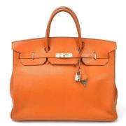 Pre-owned Fabric handbags Hermès Vintage , Orange , Dames