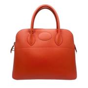 Pre-owned Fabric handbags Hermès Vintage , Orange , Dames