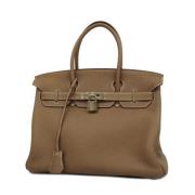 Pre-owned Fabric handbags Hermès Vintage , Brown , Dames