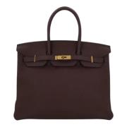 Pre-owned Leather handbags Hermès Vintage , Brown , Dames