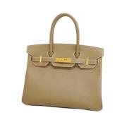 Pre-owned Fabric handbags Hermès Vintage , Beige , Dames