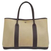 Pre-owned Fabric handbags Hermès Vintage , Beige , Dames